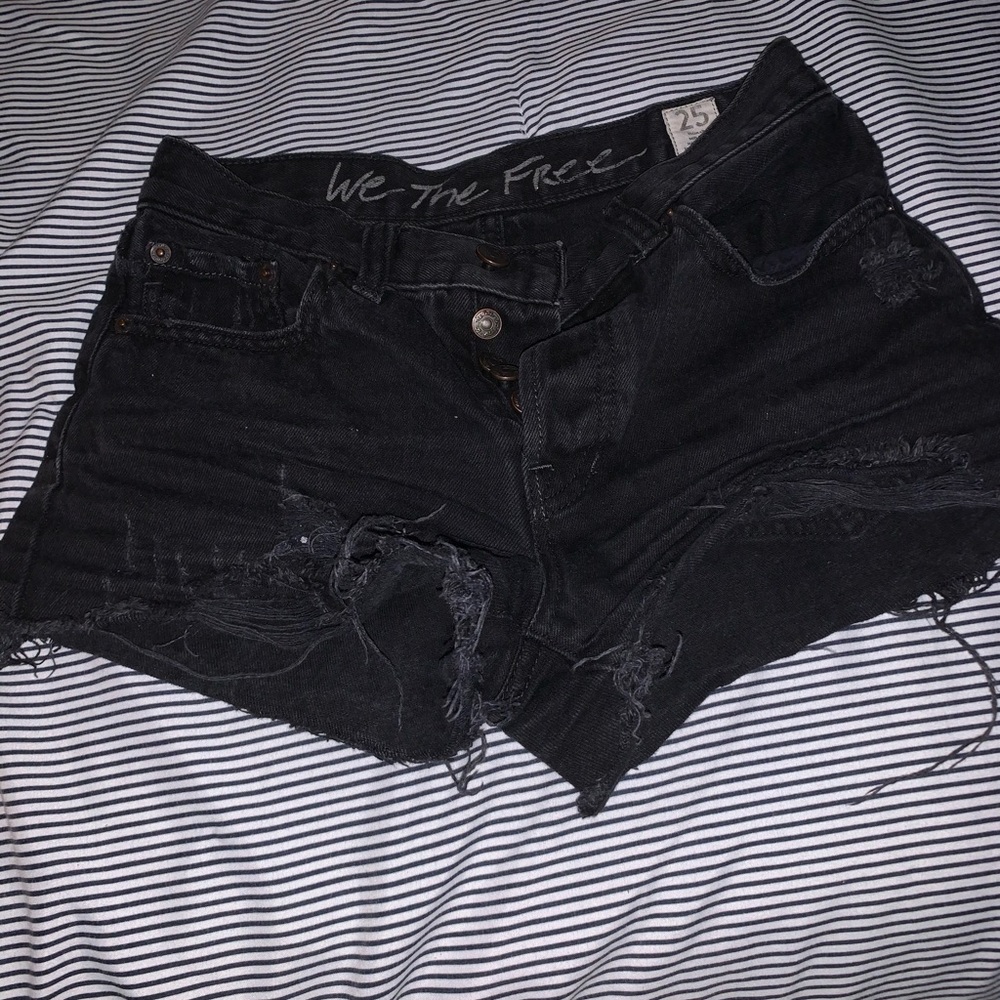 Ripped black shorts